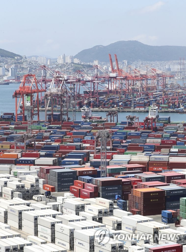 Containers for exports and imports are stacked at a pier in South Korea's largest port city of Busan on July 1, 2022. South Korea logged a trade deficit of $10.3 billion in the January-June period, the highest figure for any first-half period, due to high global energy prices, according to data from the Ministry of Trade, Industry and Energy. (Yonhap)