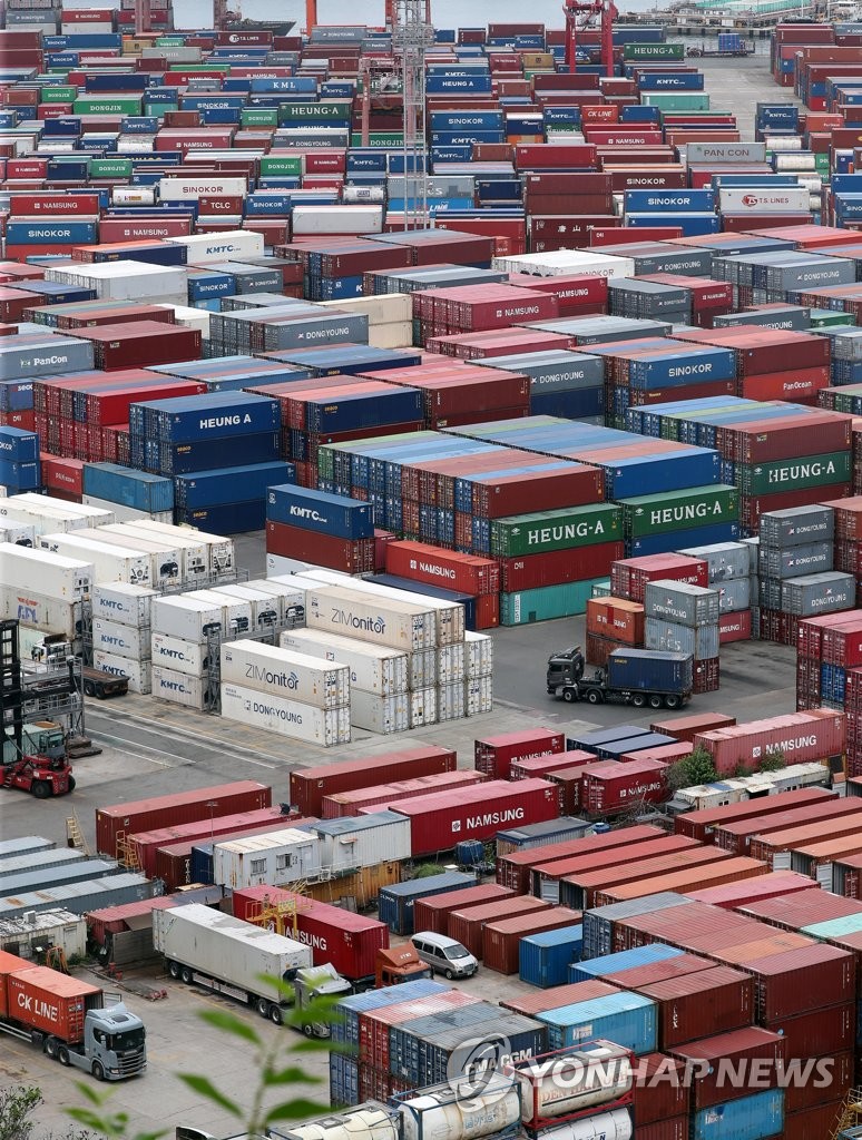 Containers for export are stacked at a pier in South Korea's largest port city of Busan on Aug. 1, 2022. South Korea suffered a trade deficit of US$4.67 billion for the fourth consecutive month in July over high global energy prices, with exports and imports standing at US$60.7 billion and $65.37 billion, respectively, according to the ministry. (Yonhap)