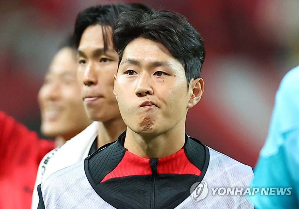 In this file photo from Sept. 27, 2022, South Korean midfielder Lee Kang-in reacts to his benching after South Korea's 1-0 victory over Cameroon in a friendly football match at Seoul World Cup Stadium in Seoul. (Yonhap)