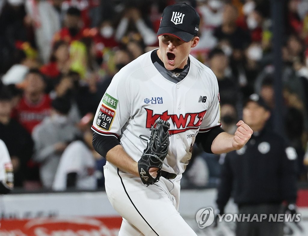 Wes Benjamin of the KT Wiz celebrates after completing the top of the eighth inning against the Kia Tigers in a Korea Baseball Organization wild card game at KT Wiz Park in Suwon, 35 kilometers south of Seoul, on Oct. 13, 2022. (Yonhap)