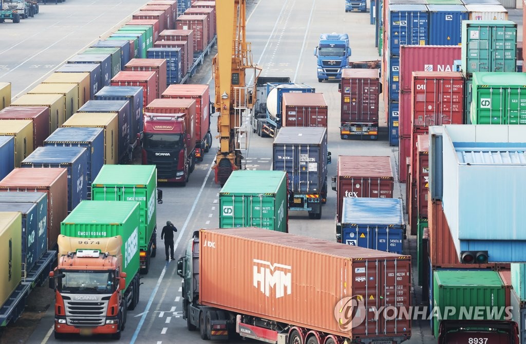 Containers are piled up at a logistics center in Uiwang, south of Seoul, in this file photo taken on Dec. 12, 2022. (Yonhap)