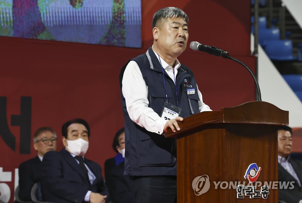 Umbrella union leader vows to stand up against gov't reform of workweek
