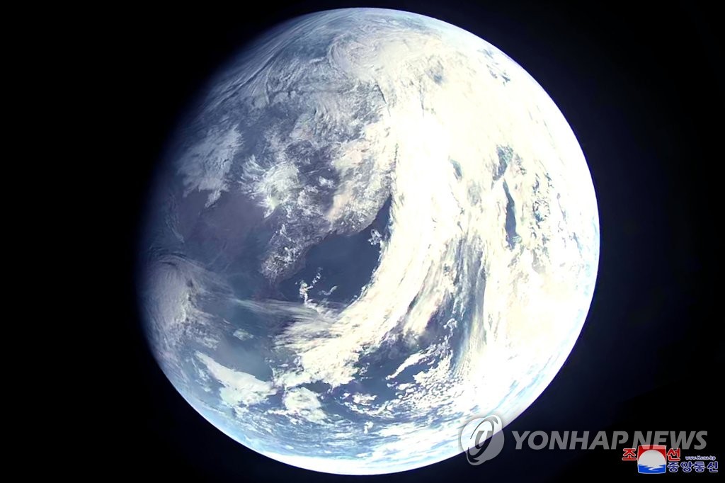 This photo, carried by North Korea's official Korean Central News Agency (KCNA) on March 17, 2023, shows an image of Earth apparently shot from space. The North claimed to have test-fired a Hwasong-17 intercontinental ballistic missile from the Sunan area in Pyongyang the previous day. (For Use Only in the Republic of Korea. No Redistribution) (Yonhap)