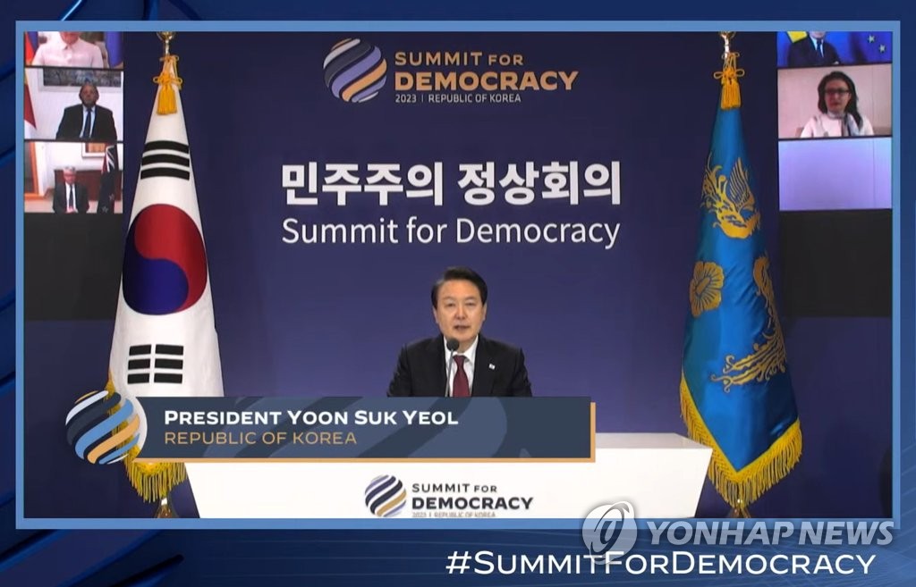 This screenshot shows President Yoon Suk Yeol delivering remarks during the first plenary session of the Summit for Democracy from the former presidential compound of Cheong Wa Dae in Seoul on March 29, 2023. (PHOTO NOT FOR SALE) (Yonhap)