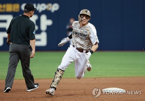 Yonhap Interview) Pitcher rides improved slider to sweeping success in KBO