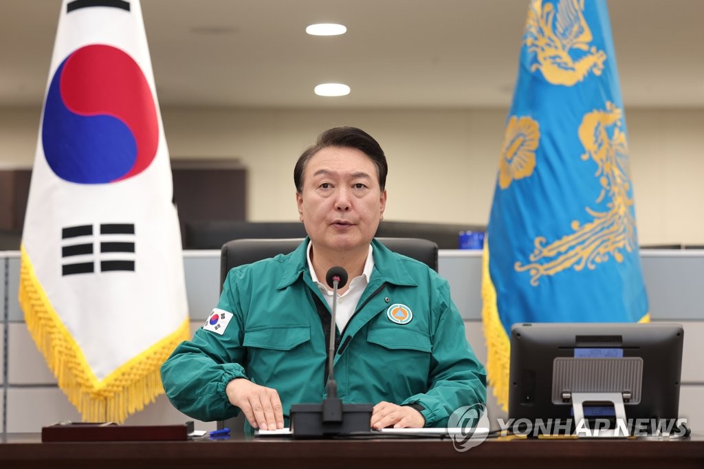 President Yoon Suk Yeol speaks during an emergency meeting convened to discuss readiness against Typhoon Khanun at the presidential office building in Seoul on Aug. 8, 2023, in this photo provided by his office. (PHOTO NOT FOR SALE) (Yonhap)