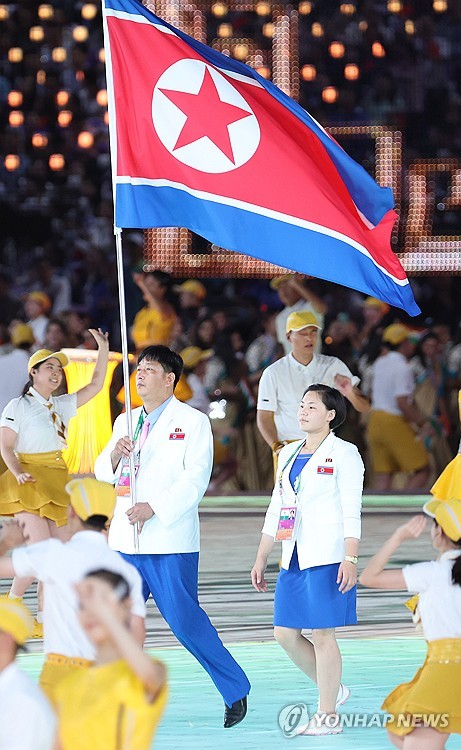 N. Korean flag bearers at Asian Games opening
