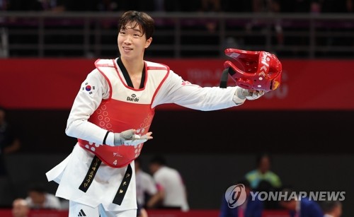 Park Woo-hyeok wins taekwondo gold