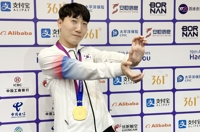 (2nd LD) (Asiad) S. Korea wins 1st esport gold medal from Street Fighter V