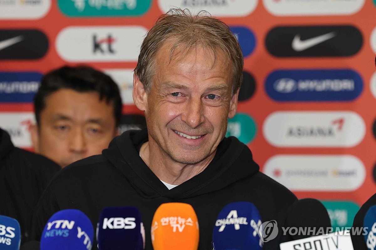 Jurgen Klinsmann, head coach of the South Korean men's national football team, speaks to reporters at Incheon International Airport, west of Seoul, on Feb. 8, 2024, after returning from the Asian Football Confederation Asian Cup in Qatar. (Yonhap)