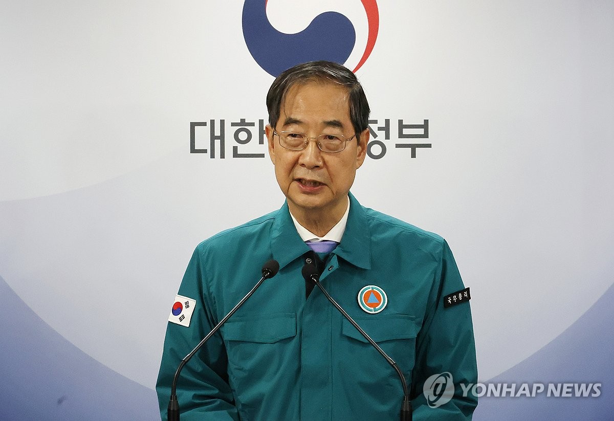 談話を発表する韓首相＝１６日、ソウル（聯合ニュース）