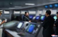 N.K. leader inspects destroyer Choe Hyon